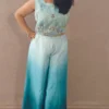 Model wearing peacock blue ombre satin co-ord set with hand-embroidered crop